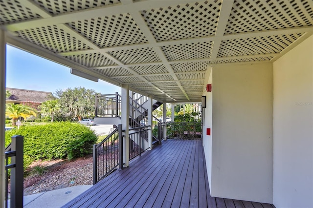 wooden deck featuring stairway