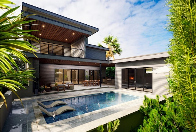 view of pool with a patio, a jacuzzi, and an outdoor living space