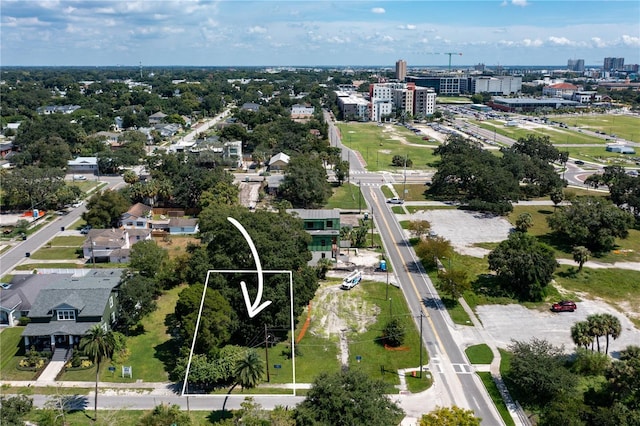 drone / aerial view with a view of city