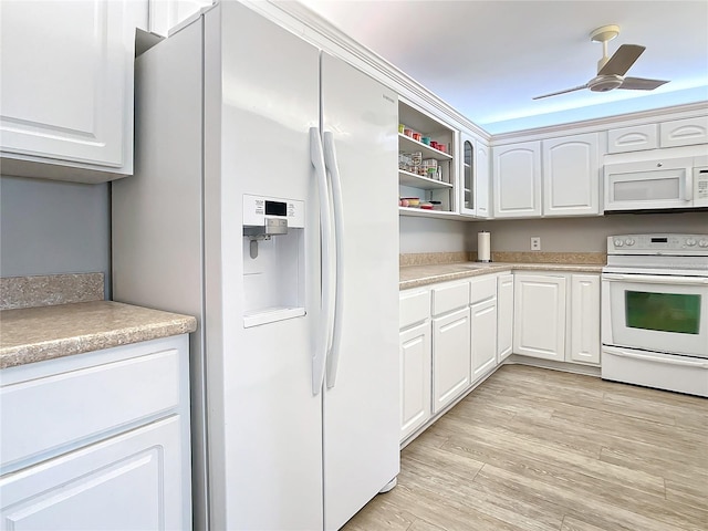 kitchen with light hardwood / wood-style flooring, white appliances, ceiling fan, and white cabinetry