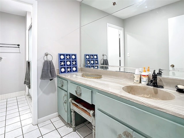 bathroom with vanity and tile patterned floors