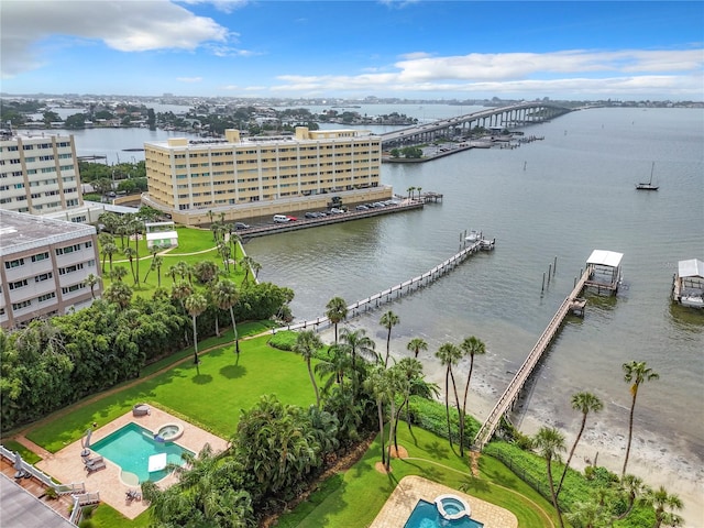 birds eye view of property featuring a water view