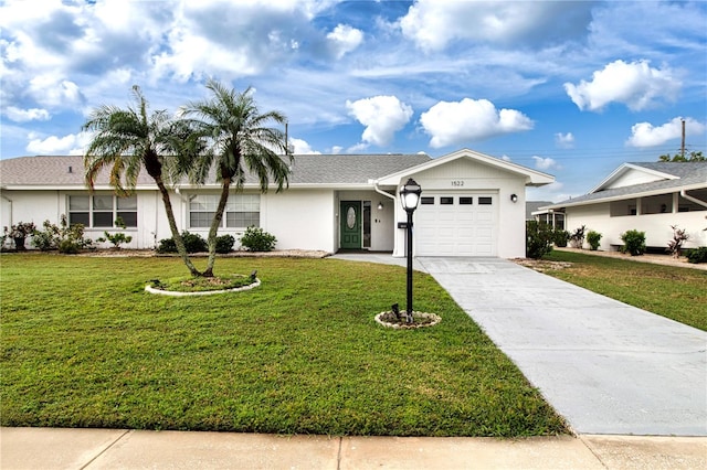 ranch-style home featuring a front yard and a garage