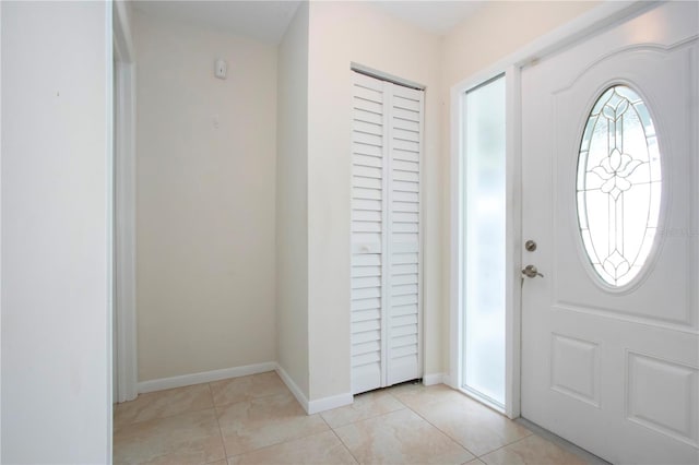 view of tiled foyer entrance