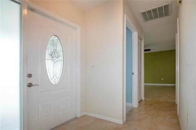 view of tiled foyer entrance