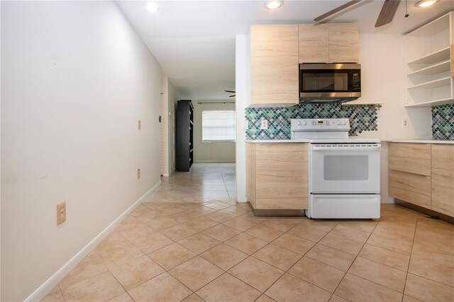 kitchen featuring tasteful backsplash, light tile patterned floors, white electric range, light brown cabinetry, and ceiling fan