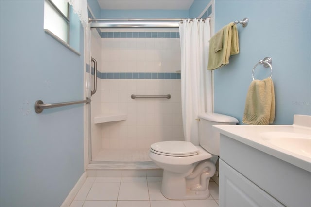 bathroom with curtained shower, vanity, toilet, and tile patterned floors