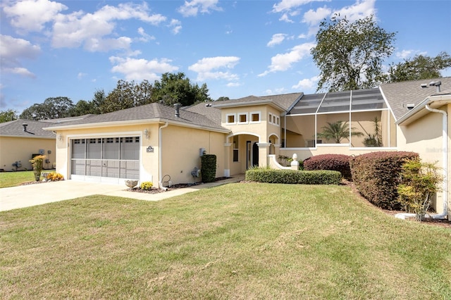 view of front of home featuring a garage and a front yard