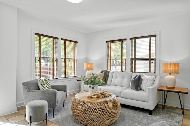 tiled living room with plenty of natural light