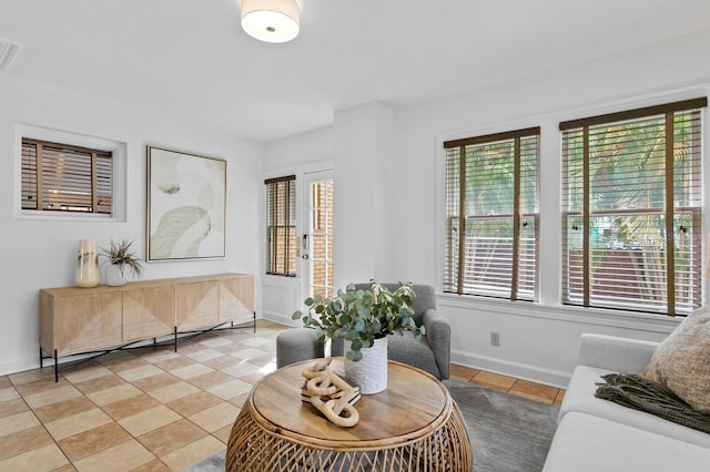 living room featuring light tile patterned flooring