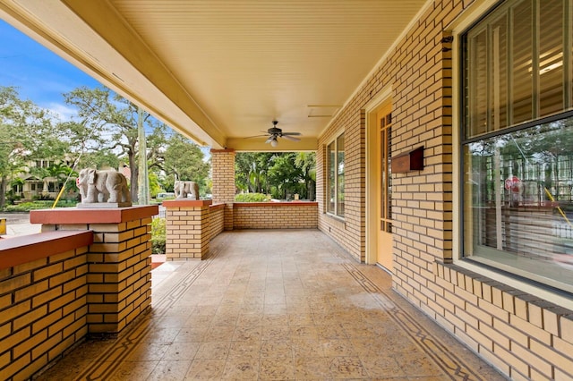 view of patio with ceiling fan