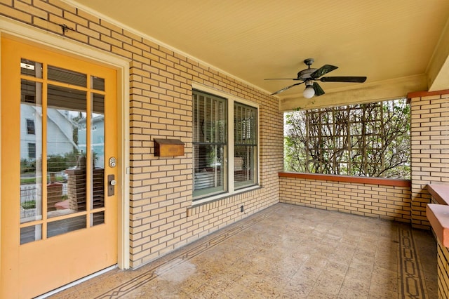 view of patio / terrace featuring ceiling fan