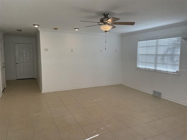 unfurnished room featuring light tile patterned floors, visible vents, ornamental molding, a ceiling fan, and baseboards