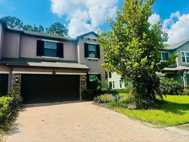 view of front of home with a garage