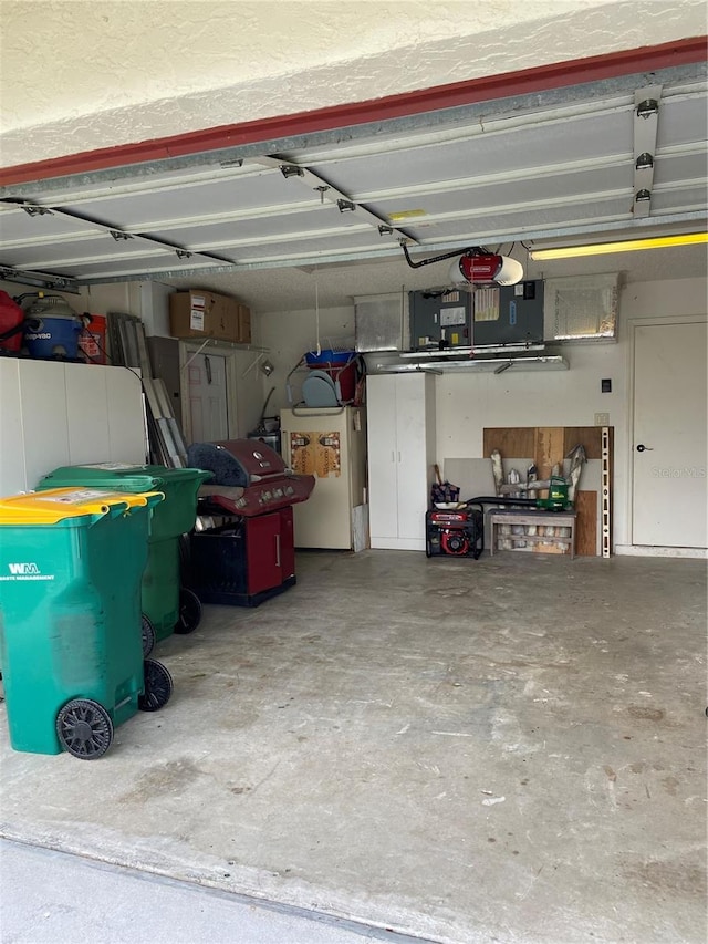 garage with white refrigerator