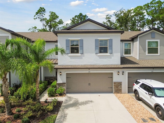 view of front of property featuring a garage