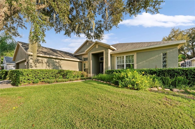 view of front facade with a front yard