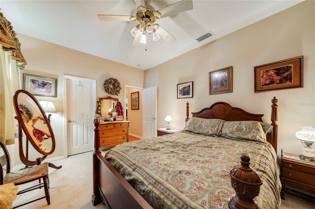 carpeted bedroom with ceiling fan