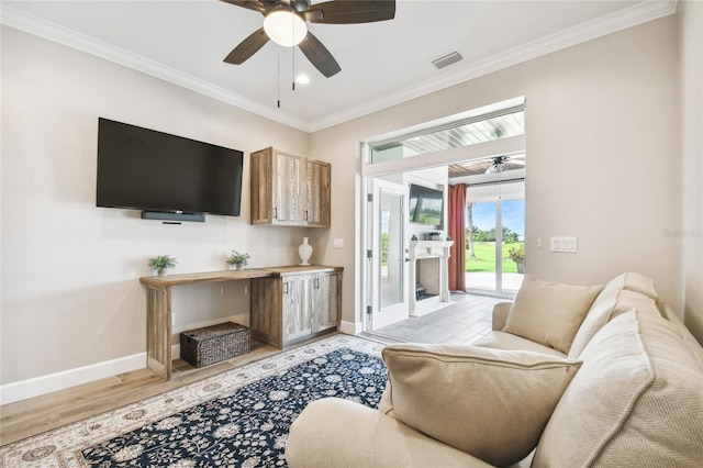 living room featuring light hardwood / wood-style flooring, ceiling fan, and ornamental molding