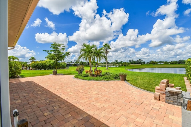 view of patio / terrace with a water view