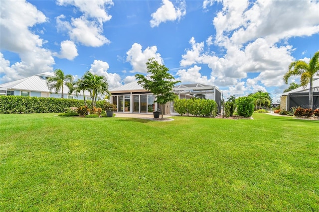 view of yard featuring a lanai