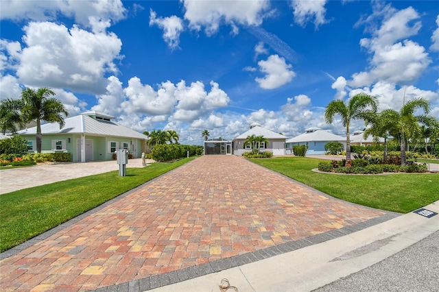 ranch-style home with a front yard