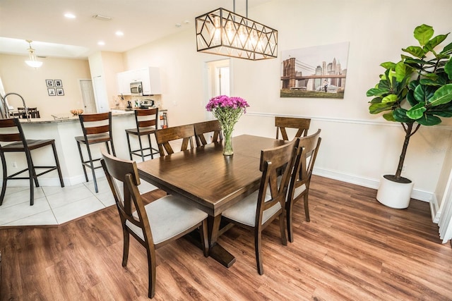 dining room featuring light hardwood / wood-style floors