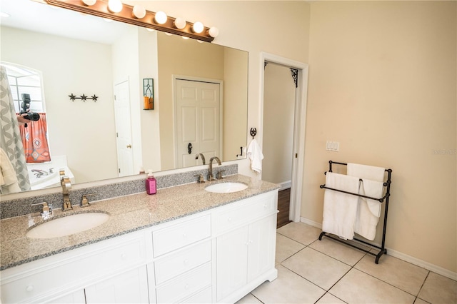 bathroom featuring vanity and tile patterned floors