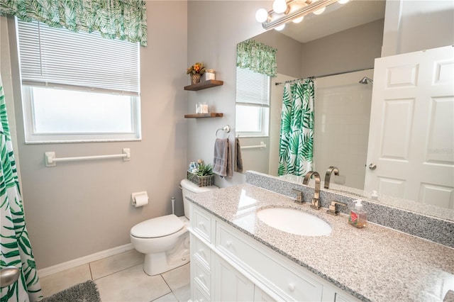 bathroom featuring a shower with curtain, vanity, toilet, and tile patterned floors