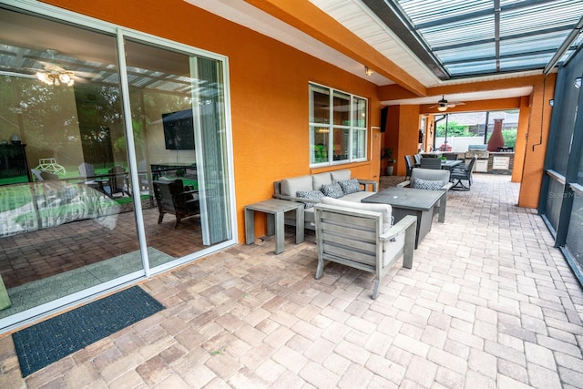 view of patio / terrace featuring ceiling fan and outdoor lounge area