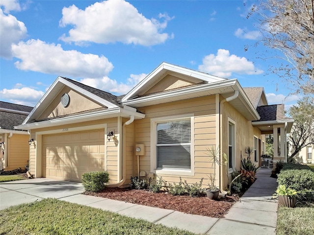 single story home with a garage