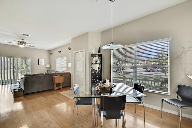 dining space featuring hardwood / wood-style floors, ceiling fan, and a healthy amount of sunlight