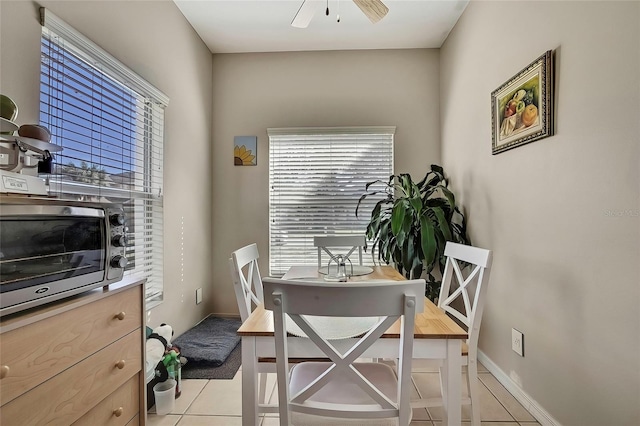 home office featuring ceiling fan and light tile patterned flooring