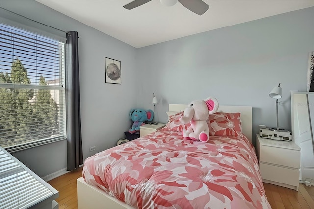 bedroom featuring ceiling fan and light wood-type flooring