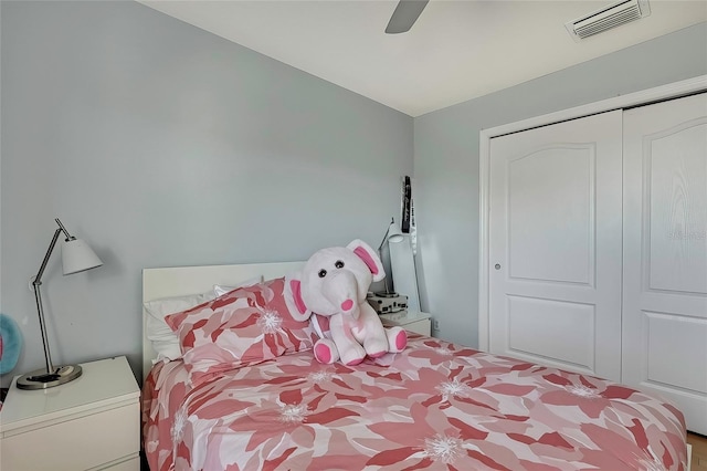 bedroom featuring a closet and ceiling fan