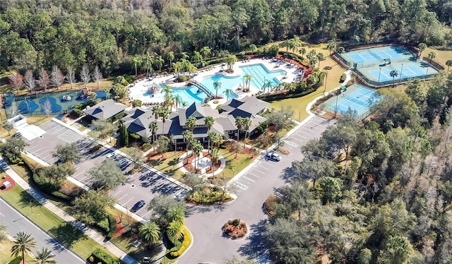20308 Oak Key Ct, Tampa, FL 33647 - view of property location with a pool area and a heavily wooded area