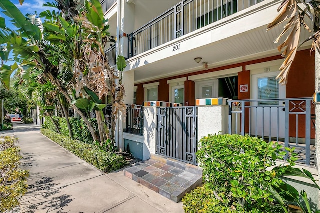 entrance to property with a porch