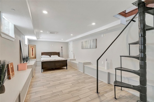 bedroom featuring light hardwood / wood-style flooring