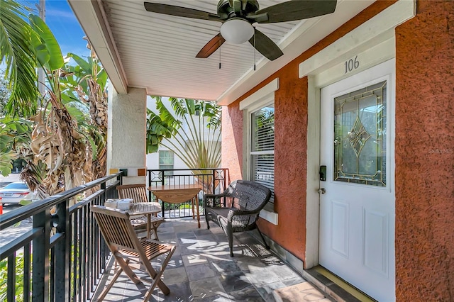 balcony featuring ceiling fan