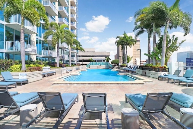 view of pool featuring a patio area