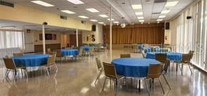 dining room featuring concrete flooring