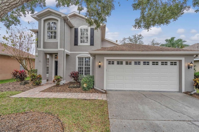 front of property featuring a garage