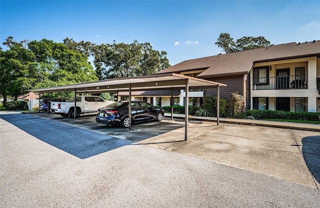 view of car parking with a carport