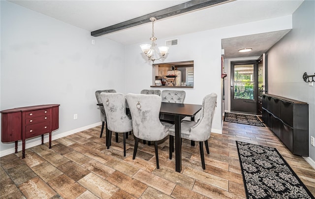 dining room featuring beam ceiling, a chandelier, and hardwood / wood-style floors