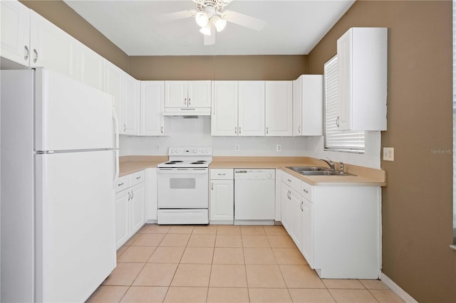 kitchen featuring white appliances, sink, ceiling fan, light tile patterned flooring, and white cabinetry