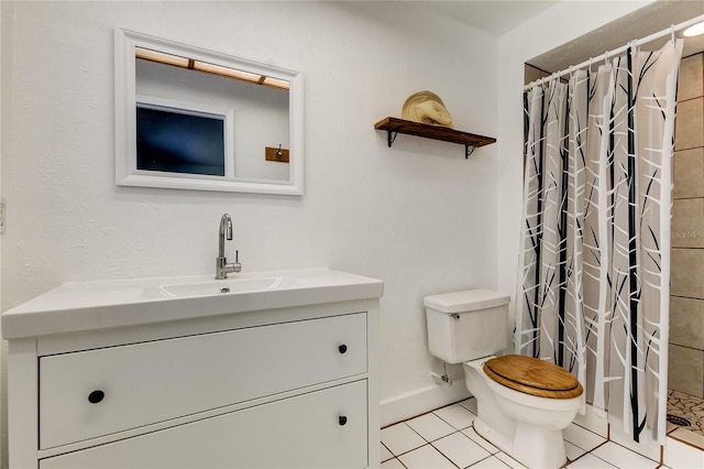 bathroom featuring vanity, toilet, tile patterned floors, and a shower with curtain