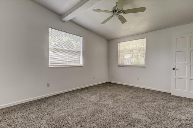 unfurnished room featuring ceiling fan, carpet floors, and vaulted ceiling with beams