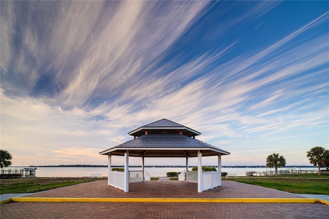 view of home's community featuring a gazebo and a water view