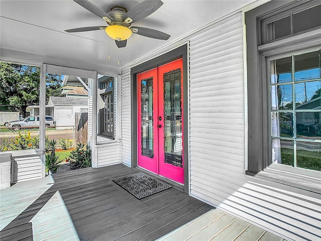 exterior space with ceiling fan and french doors