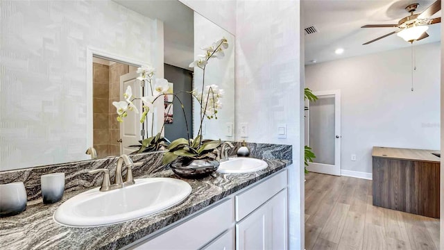 bathroom featuring vanity, ceiling fan, and hardwood / wood-style flooring